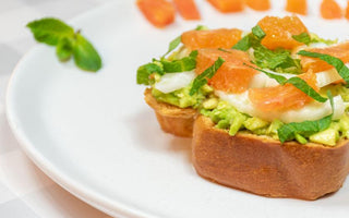 an avocado toast with citrus suprèmes & slivered fennel on bakerly hand braided brioche | bakerly